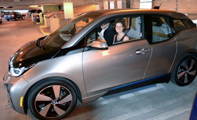 GNHCCC intern, Andrea McCarthy, in a BMW i3 electric vehicle just after a stakeholder meeting in New Haven, CT. NREL Image Gallery 37378